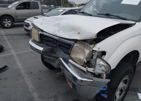 1999 Toyota Tacoma from USA, damaged, VIN 4TAWN72N9XZ467433